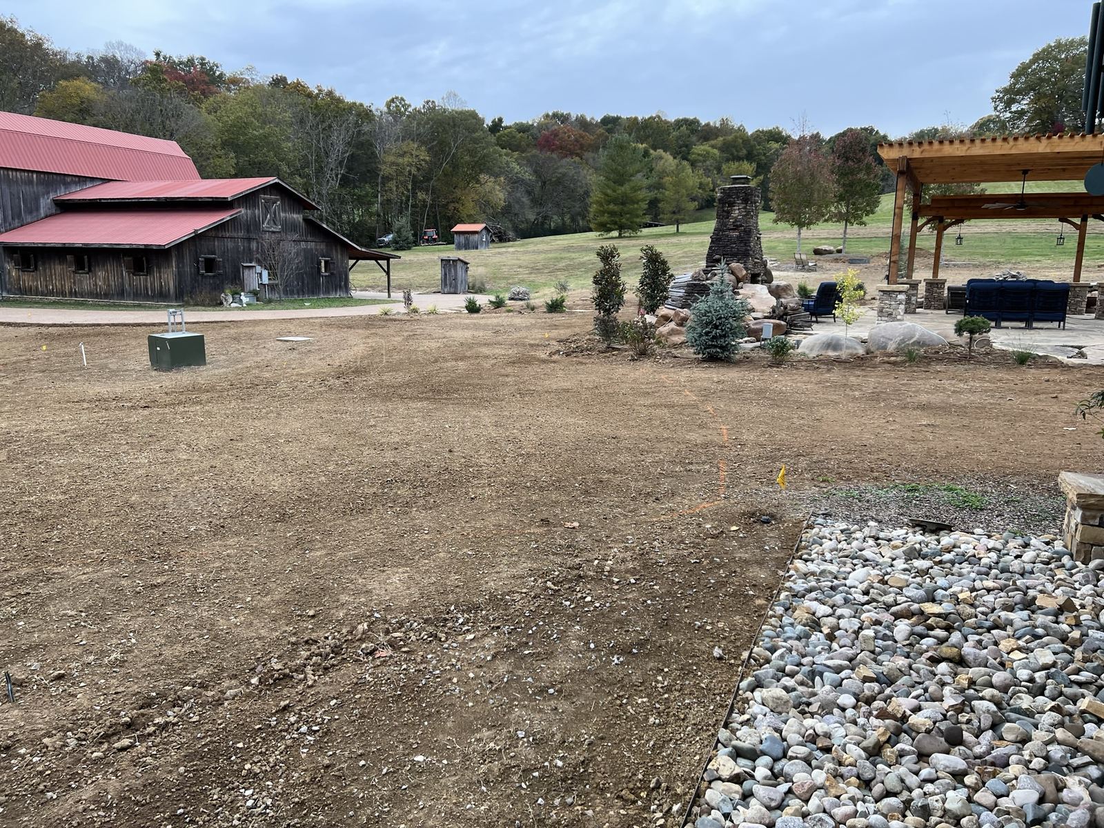 The backyard as graded dirt before the build
